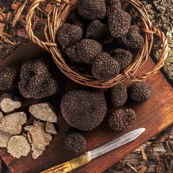 black winter truffles in a basket