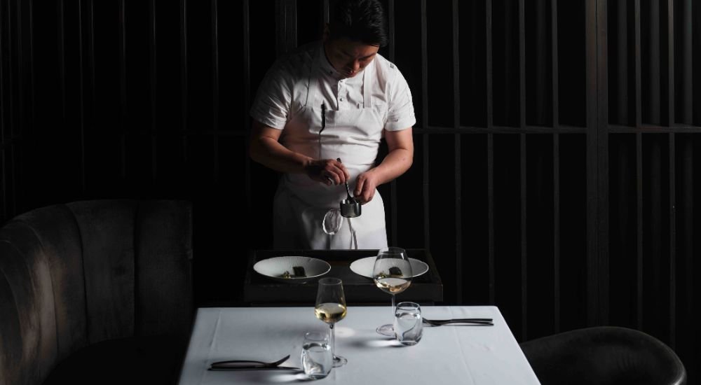 Akaiito chef at table