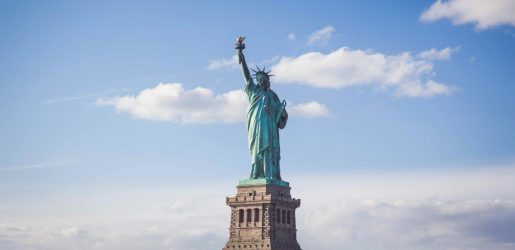 statue of liberty set against a blue sky