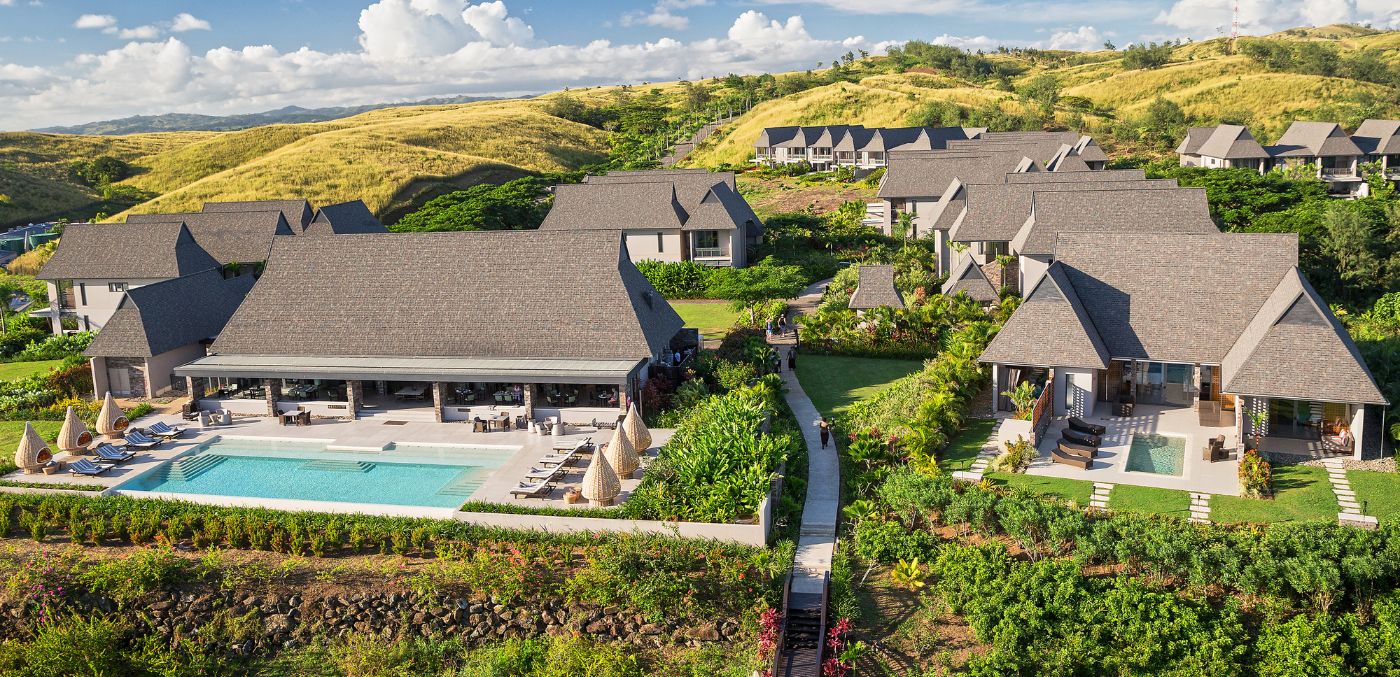 a birds eye view of the Club hill, villas and pool