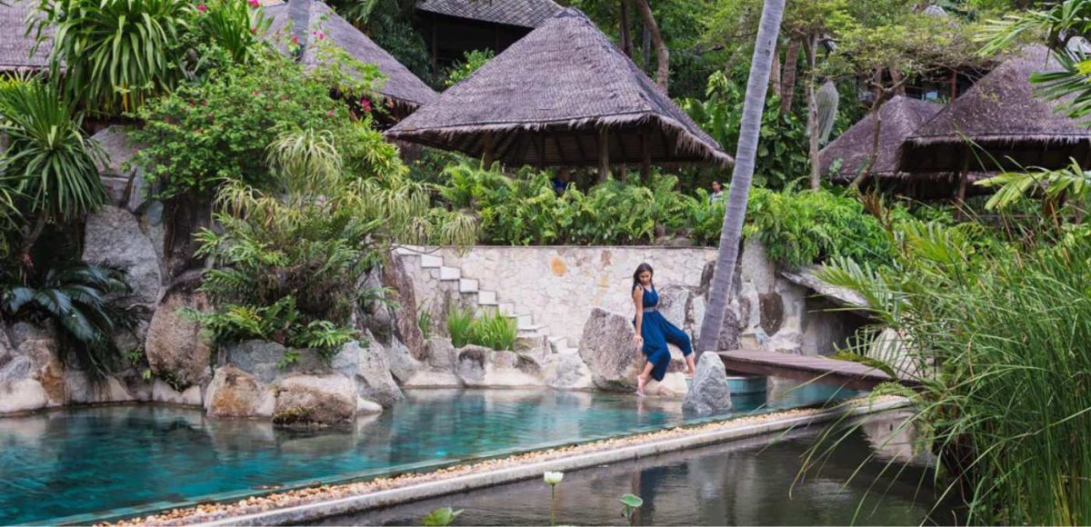 woman sitting by pool