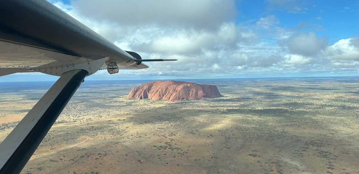 Flying over Uluru on Outback by Air