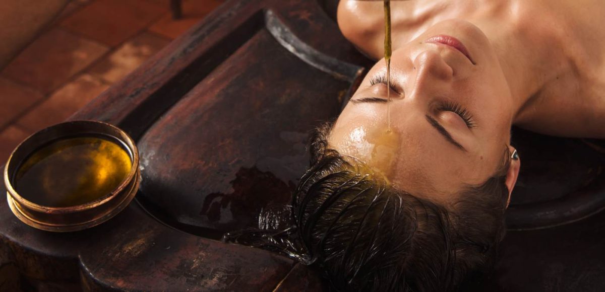 1 A Shirodhara treatment in India